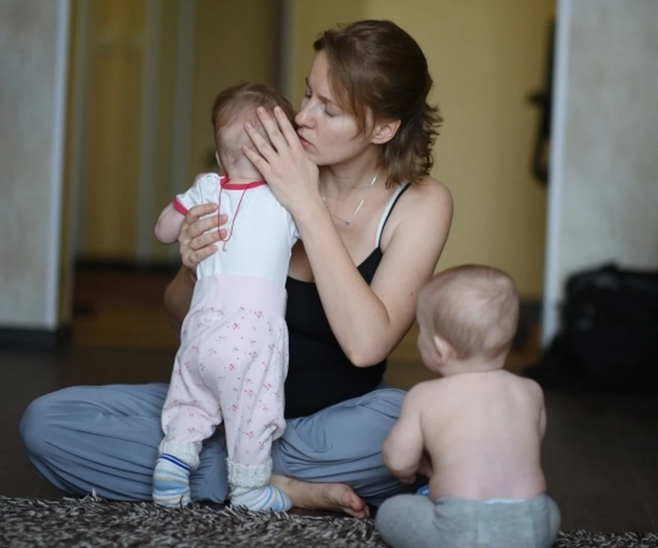 Молодая мама.