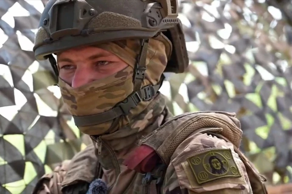 "У нас все носят знак Иисуса!", - говорит боец "Бизон". Фото: Народный фронт Запорожской области