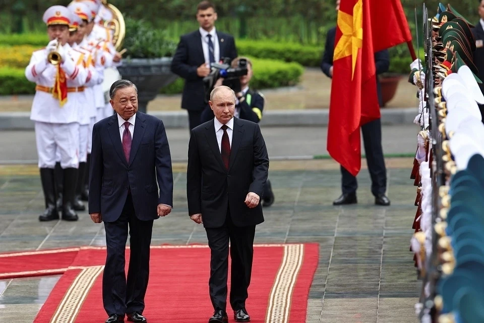 Президент России Владимир Путин и президент Вьетнама То Лам