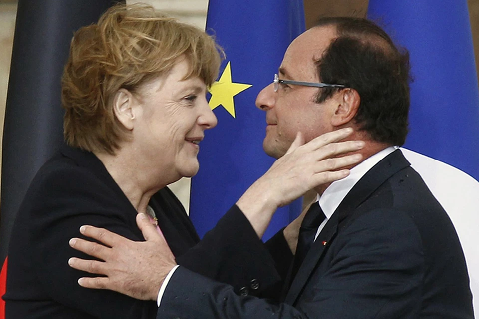 Ангела Меркель и Франсуа Олланд пообещали спасти евро