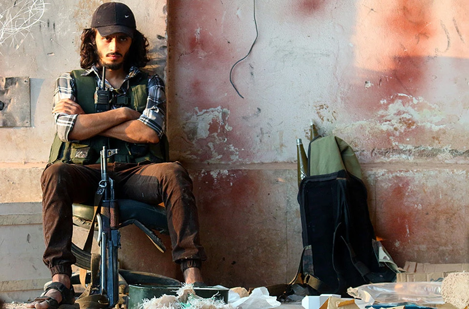 Один из бойцов сирийской оппозиции в Алеппо.